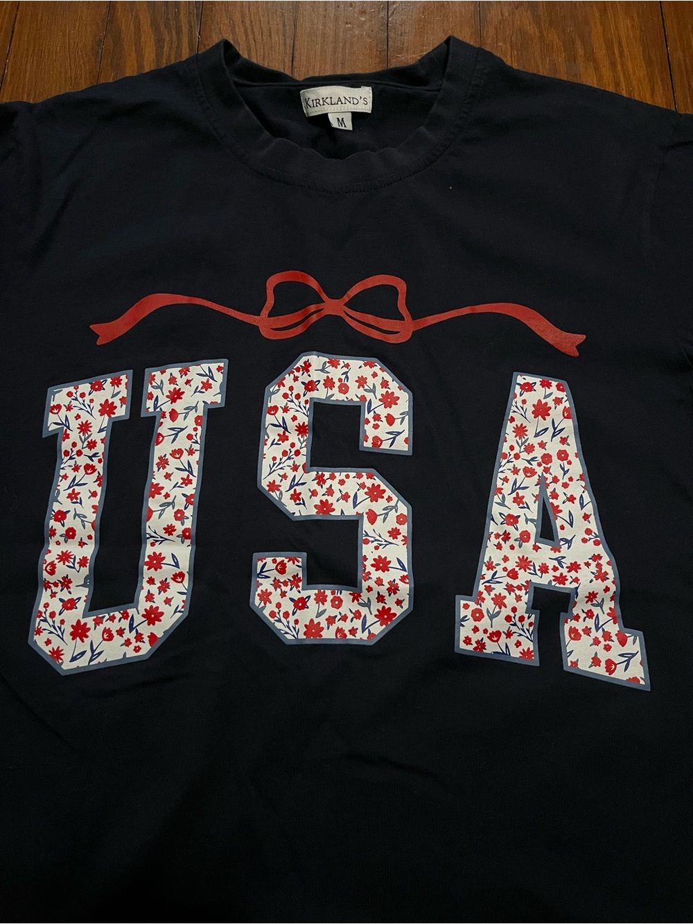 Kirkland Women’s Navy USA Graphic Tee with Red Floral and Bow Print